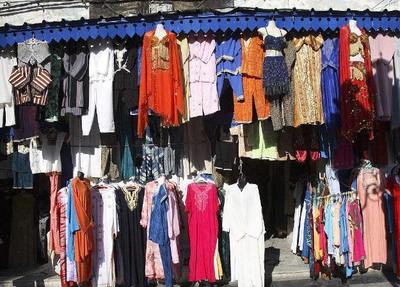 从地摊零售到跨境巨头 潘永淼的服装致富之路